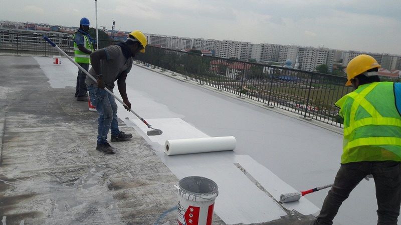 "Fiber mesh sheet being applied for roof waterproofing"